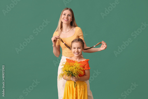 Happy mother and daughter w...