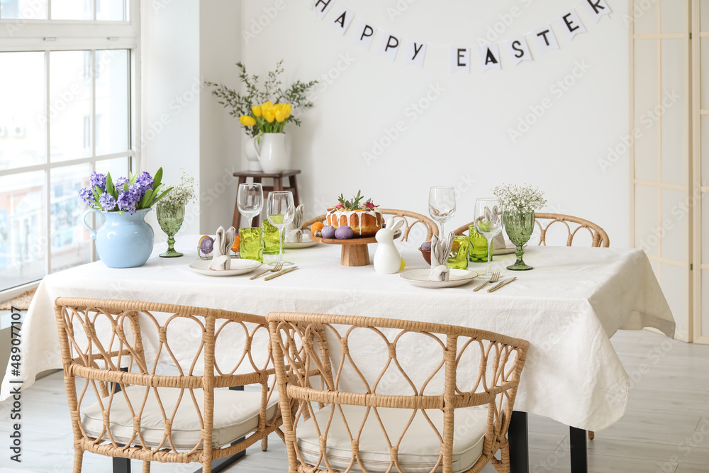Obraz premium Beautiful setting on table served for Easter celebration in room