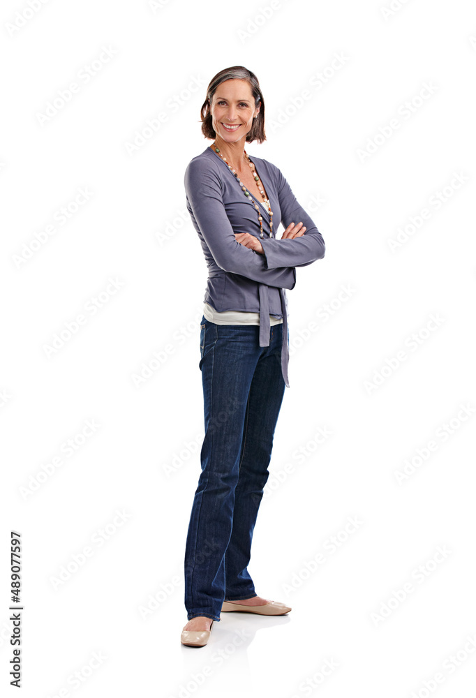 Confident and carefree. Full length studio portrait of an attractive mature woman in casualwear. Confident and carefree. Full length studio portrait of an attractive mature woman in casualwear.