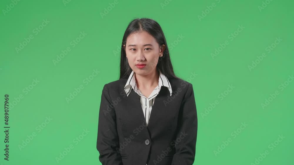 A Terrible Asian Business Woman Looking At Camera In The Green Screen Studio
A Terrible Asian Business Woman Looking At Camera In The Green Screen Studio