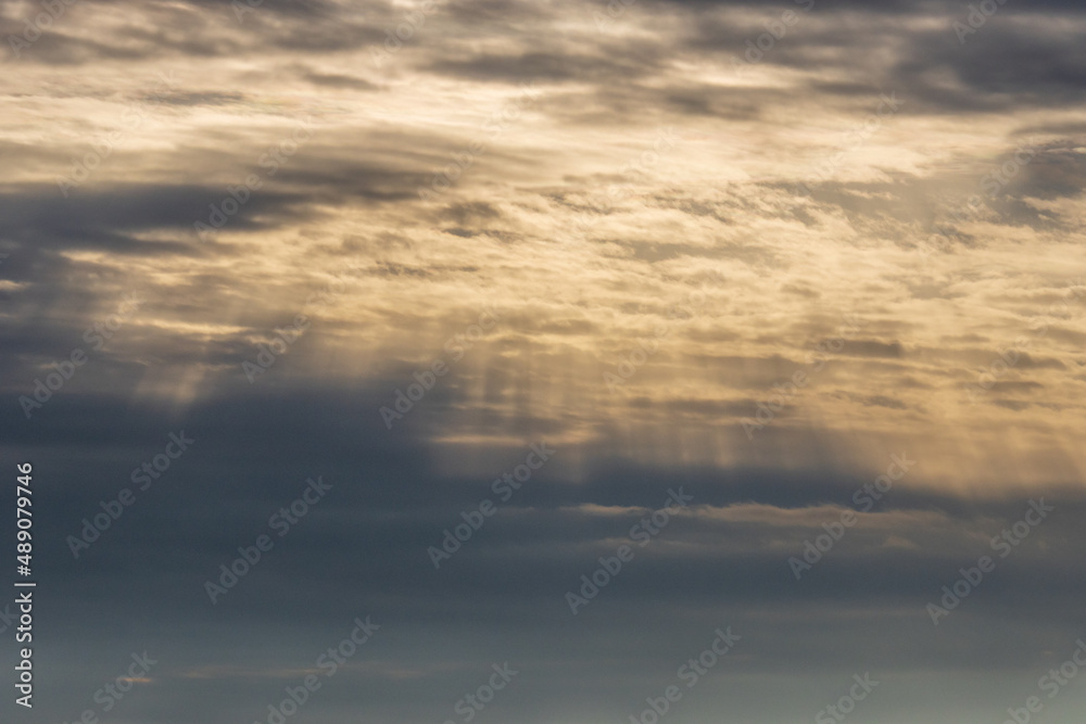 sun shining through the clouds