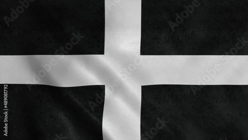 Flag of Cornwall, city of England, waving in wind. Realistic flag background photo