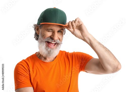 Cool mature man on white ba...