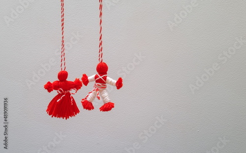 Traditional red and white dolls, symbols of the beginning of spring in the Balkan countries. Bulgarian martenitsa. photo