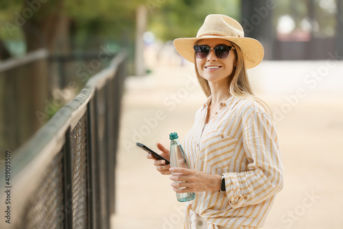 Beautiful woman with phone ...
