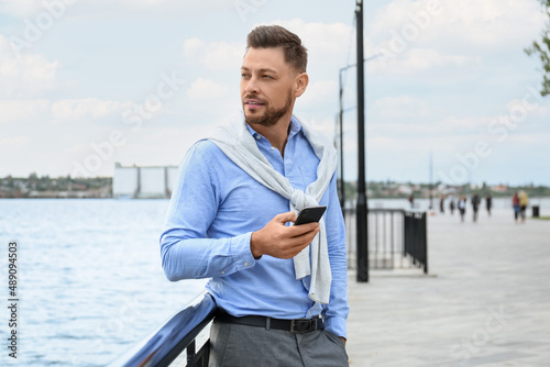 Handsome businessman with m...