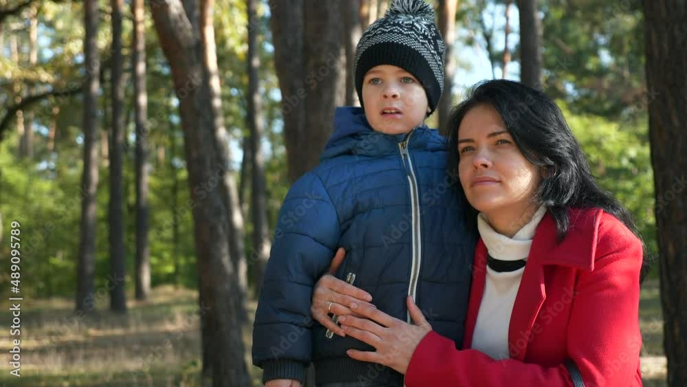 Mother Show Tell Her Son About Nature Environment in City Park. Woman Rest With Child Kid Boy. Sunny Day. 2x Slow motion 60fps 4K Mother Show Tell Her Son About Nature Environment in City Park. Woman Rest With Child Kid Boy. Sunny Day. 2x Slow motion 60fps 4K
