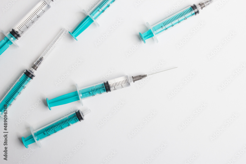 medical syringe with a vaccine isolated on a white background. the concept of vaccination of the population against the virus and diseases medical syringe with a vaccine isolated on a white background. the concept of vaccination of the population against the virus and diseases