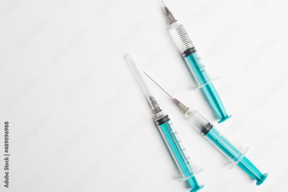 medical syringe with a vaccine isolated on a white background. the concept of vaccination of the population against the virus and diseases medical syringe with a vaccine isolated on a white background. the concept of vaccination of the population against the virus and diseases
