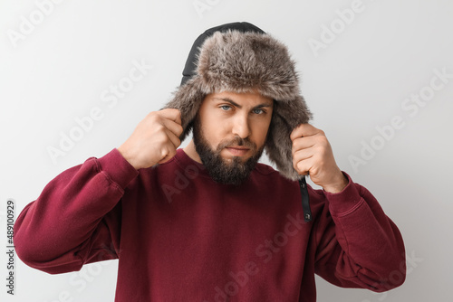 Stylish bearded man in swea...