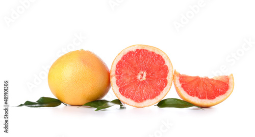 Fototapeta Naklejka Na Ścianę i Meble -  Fresh grapefruit pieces on white background