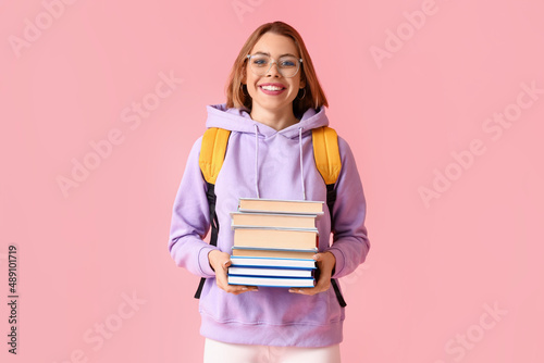 Female student with books o...