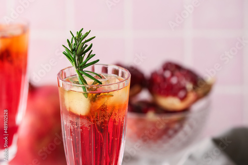Wallpaper Mural Glass of tasty pomegranate cocktail on tile background, closeup Torontodigital.ca