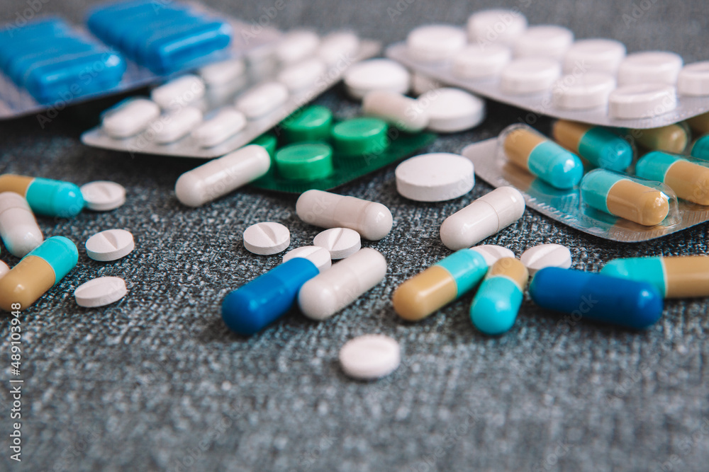 Medicine or tablets on table - medical health care concept Medicine or tablets on table - medical health care concept