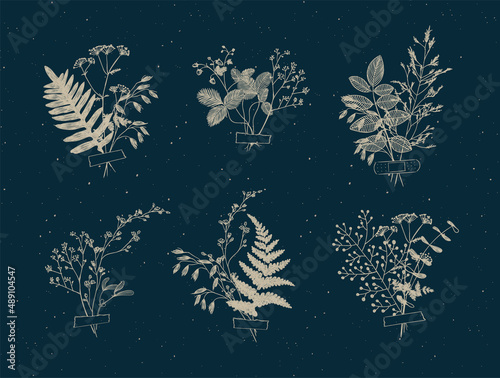 Branches and leaves are collected into a bouquet with sticker drawing in beige color on blue background