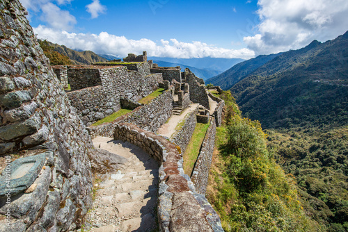 The stunning view of the valley below the Sayaqmarka ruins on the Inca Trail to Machu Picchu, Peru.  photo