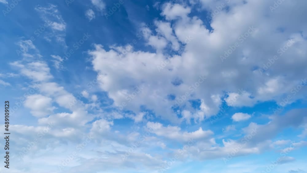 Blue sky white clouds with Puffy fluffy white clouds. Cumulus cloud cloudscape timelapse Amazing summer blue sky Time Lapse in Nature good weather day background 4-K Blue sky white clouds with Puffy fluffy white clouds. Cumulus cloud cloudscape timelapse Amazing summer blue sky Time Lapse in Nature good weather day background 4-K
