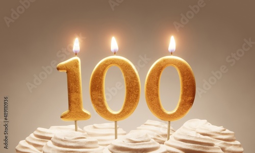100th birthday or anniversary celebration. Lit golden number candles on cake with icing in neutral tones. 3D rendering photo