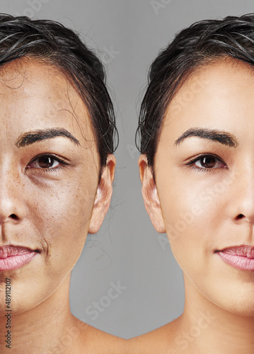 The process of ageing. Studio shot of a womans face halved with one side old and one side young with wet hair against a gray background.