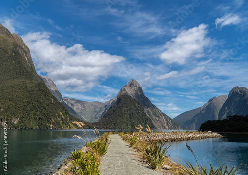 Mitre Peak in Milford Sound on a Sunny Summers Day in Fiordland National Park in the South Island of New Zealand photo