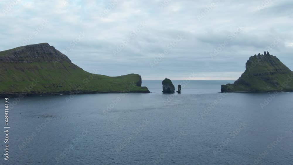Drone Towards Drangarnir Sea Stacks In Faroe Islands Drone Towards Drangarnir Sea Stacks In Faroe Islands