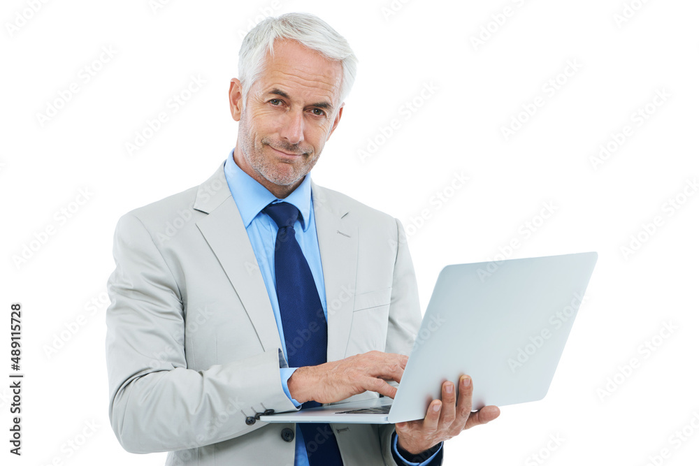 Its time for business. Studio shot of a mature businessman working on a laptop isolated on white.