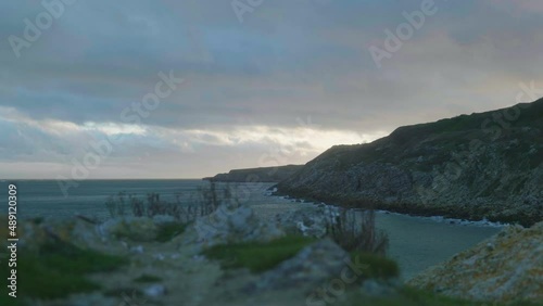 Wallpaper Mural 4K Cinematic landscape shot of the beach of Church Ope, Portland, during sunset. Torontodigital.ca
