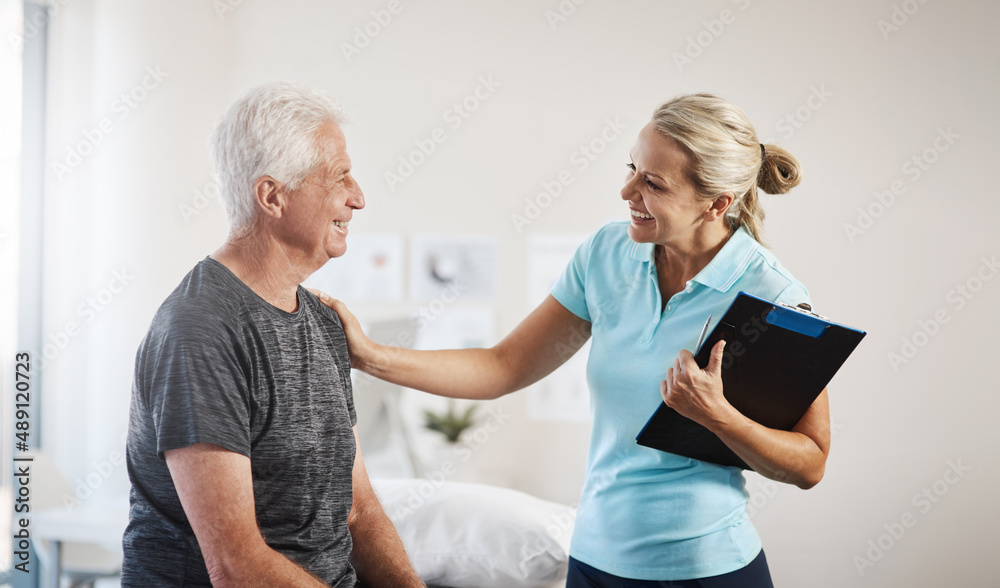 Ill have you back to 100 in no time. Cropped shot of a mature female physiotherapist working with a senior male patient in her office. Ill have you back to 100 in no time. Cropped shot of a mature female physiotherapist working with a senior male patient in her office.