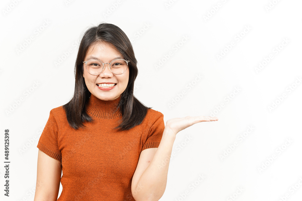Showing and Presenting Product on Open Palm Of Beautiful Asian Woman Isolated On White Background Showing and Presenting Product on Open Palm Of Beautiful Asian Woman Isolated On White Background