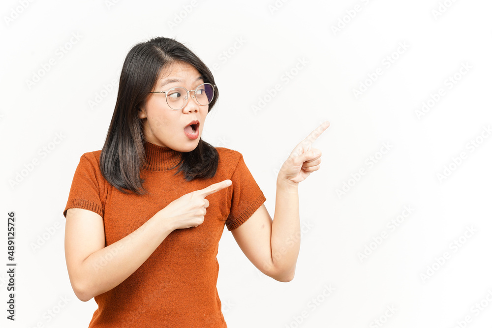 Showing Product and Pointing Side Of Beautiful Asian Woman Isolated On White Background Showing Product and Pointing Side Of Beautiful Asian Woman Isolated On White Background