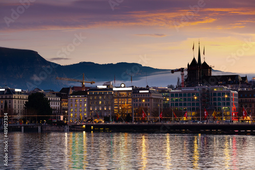 Geneva cityscape overview with St Pierre Cathedral at night in winter, Switzerland