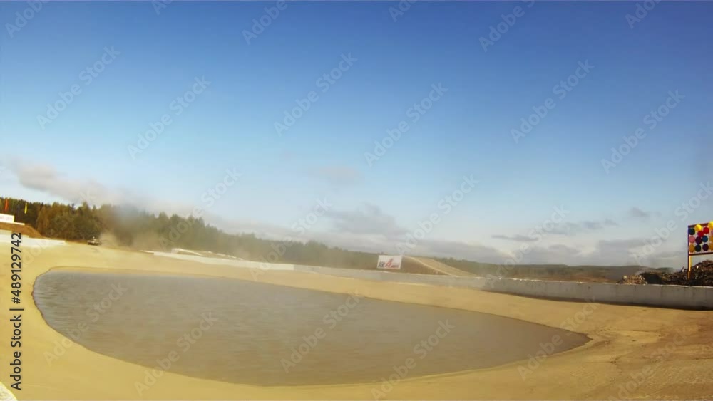 The Russian heavy tank easily overcomes the water reservoir. Waves of spray hit the camera and turn it over. The Russian heavy tank easily overcomes the water reservoir. Waves of spray hit the camera and turn it over.