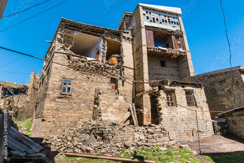 old destroyed housing abandoned by refugees
