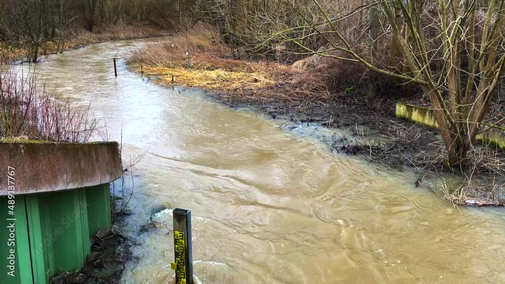 the water level can be read from a water level gauge placed in the river