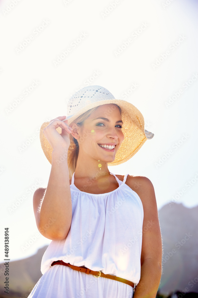 Styled for summer. Portrait of a beautiful young woman enjoying a bright summers day outdoors. Styled for summer. Portrait of a beautiful young woman enjoying a bright summers day outdoors.