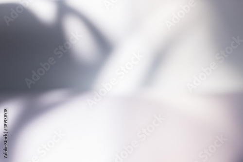 sunlight shadow on abstract blur white wall background texture