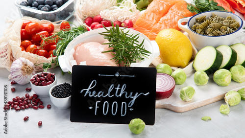 Healthy food assortment on light background.