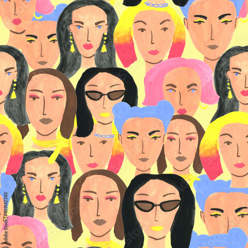Seamless pattern with different young woman faces, colorful hair on yellow background © Elena