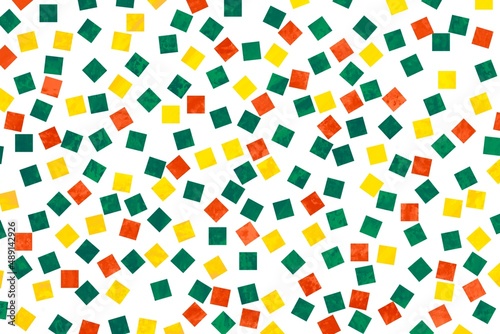 抽象イラスト）白背景にペイントされた黄色と緑とオレンジの正方形 カラフル ポップ 紙吹雪