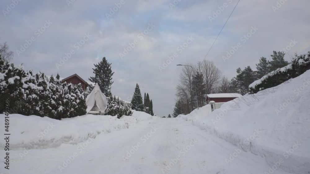 Driving In Roadway Covered With Thick Layer Of White Snow - POV Driving In Roadway Covered With Thick Layer Of White Snow - POV