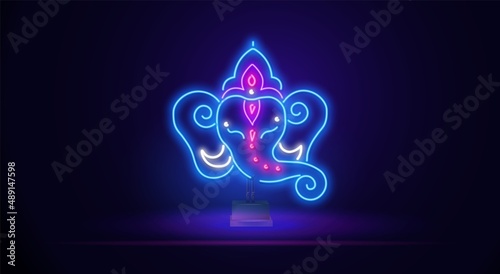 Neon Vector linear illustration of the symbol of the religion of the Indian god of elephant games. Neon ganesha on a stand and dark background