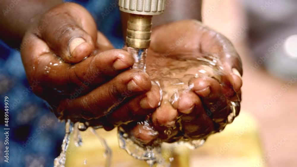 Washing hands Africa slow motion