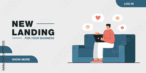 Boy using laptop flat vector illustration. Young guy sitting on sofa with digital device giving likes on social media. Online communication concept for banner, website design or landing web page.