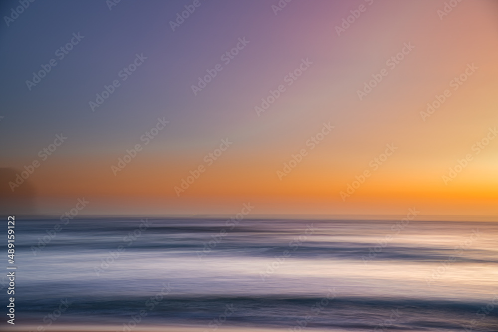 Orange glow panning sunrise seascape