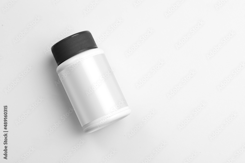 Bottle mockup on white background. Medicine plastic package for pills, vitamins or capsules. Vector empty jar, container mock up. Bottle mockup on white background. Medicine plastic package for pills, vitamins or capsules. Vector empty jar, container mock up.