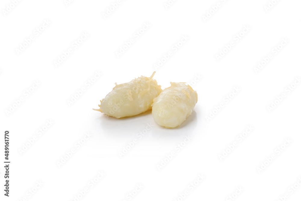 Two potato gnocchi isolated on white background Two potato gnocchi isolated on white background