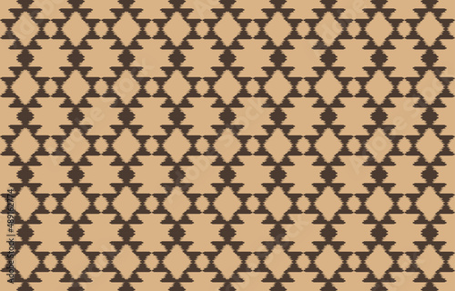 Beautiful ethnic kat art. Seamless rhombus pattern in tribal, folk embroidery chevron style. Ogee geometric art ornament print. Design for carpet, wallpaper, clothing, wrapping, fabric. photo