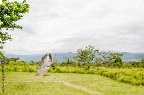 Views in detail of the megalith or 
Megalitik Palindo, Tadulako, Pokekea, Sleeping, Sepe located in Poso Regency, also rice fields and markets. Sulawesi. photo