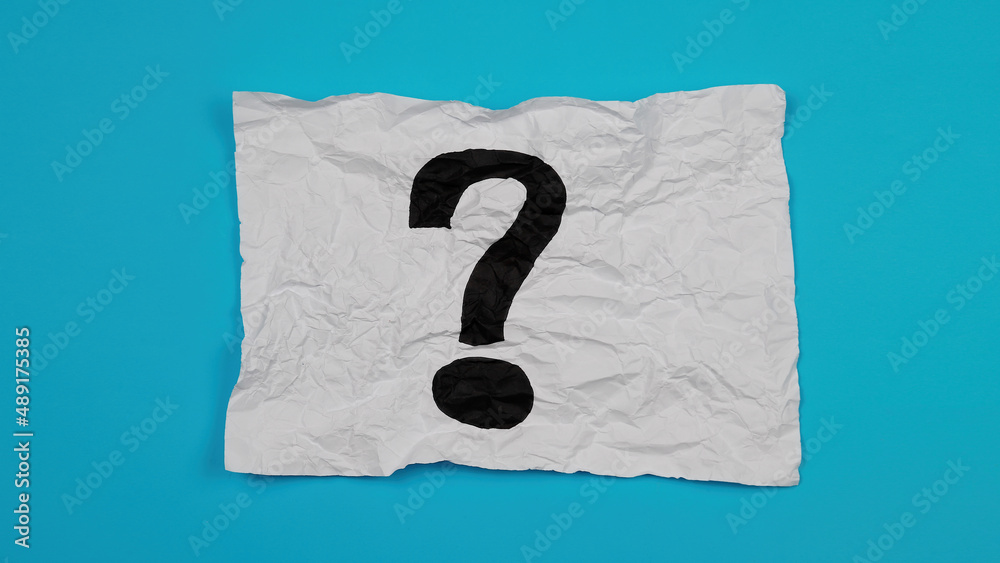 Paper stick with question mark on blue background. question mark drawn ...