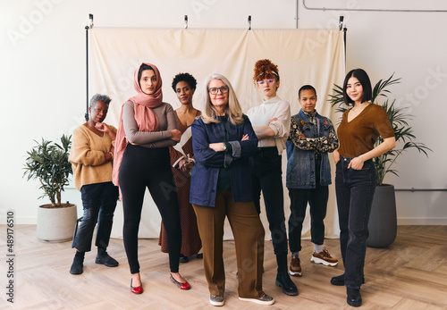 International Women's Day portrait of multi ethnic mixed age range women looking confidently towards camera photo